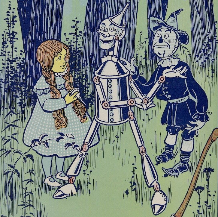 The Tin Woodman with Alice and the Scarecrow, in W. W. Denslow’s Illustrations for the Wonderful Wizard of Oz (1900).
